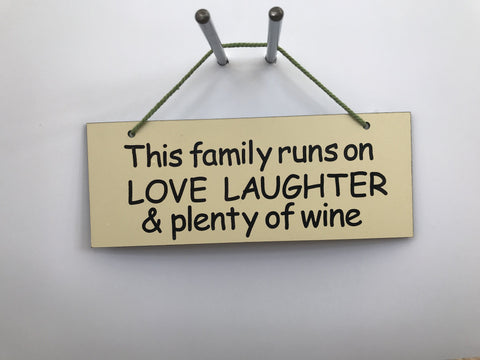 This family runs on LOVE LAUGHTER & plenty of wine Gifts www.HouseSign.co.uk 