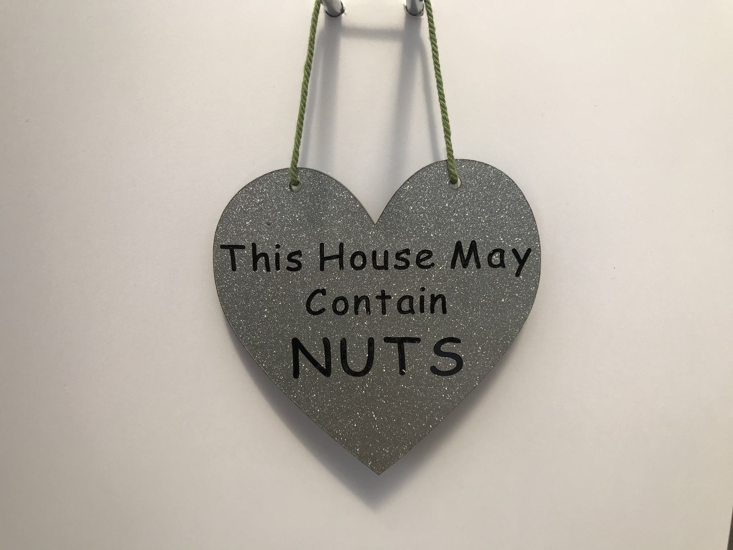 This House May Contain NUTS Gifts www.HouseSign.co.uk