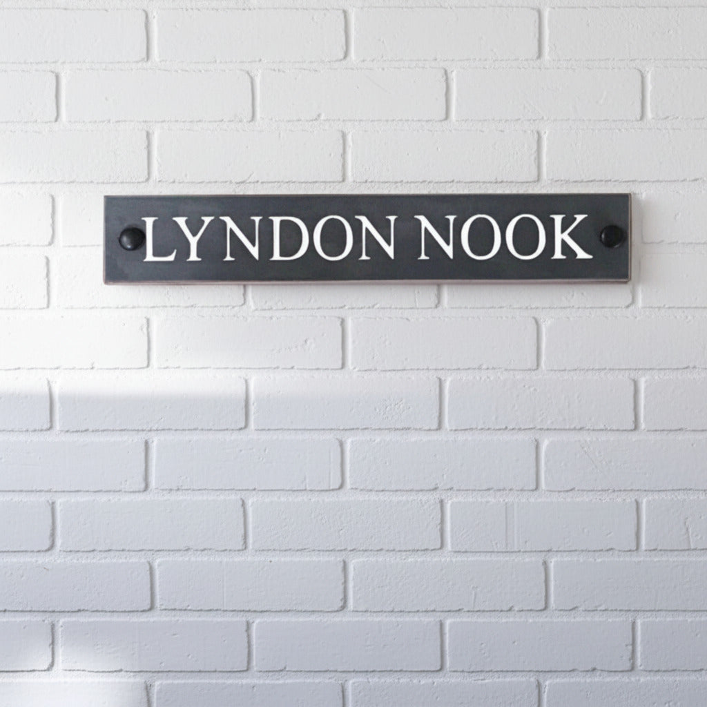 Introducing our stunning 30cm x 5cm Polished Natural Slate House Sign, designed to make a lasting impression! Crafted with durability in mind, it features beautifully carved lettering that enhances its elegance and visibility. Transform your home's entrance with this exquisite sign! www.HouseSign.co.uk