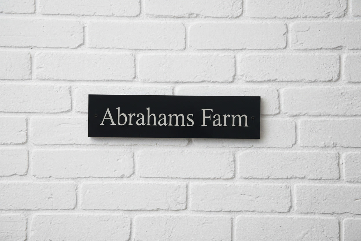 Introducing our stunning 30cm x 5cm Polished Natural Slate House Sign, designed to make a lasting impression! Crafted with durability in mind, it features beautifully carved lettering that enhances its elegance and visibility. Transform your home's entrance with this exquisite sign! www.HouseSign.co.uk