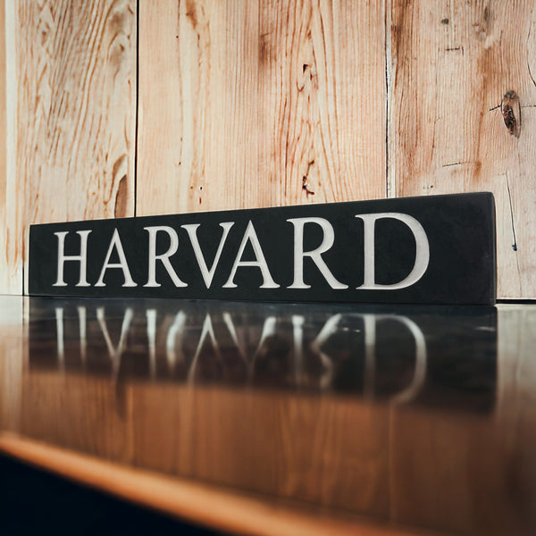 Introducing our stunning 30cm x 5cm Polished Natural Slate House Sign, designed to make a lasting impression! Crafted with durability in mind, it features beautifully carved lettering that enhances its elegance and visibility. Transform your home's entrance with this exquisite sign! www.HouseSign.co.uk
