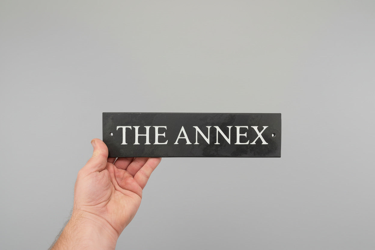 Introducing our stunning 30cm x 7.5cm Polished Natural Slate House Sign, designed to make a lasting impression! Crafted with durability in mind, it features beautifully carved lettering that enhances its elegance and visibility. Transform your home's entrance with this exquisite sign! www.HouseSign.co.uk