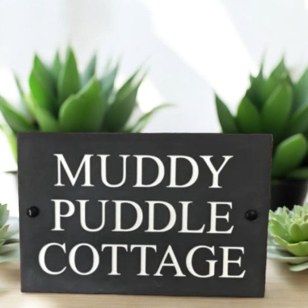 Introducing our stunning 30cm x 20cm Polished Natural Slate House Sign, designed to make a lasting impression! Crafted with durability in mind, it features beautifully carved lettering that enhances its elegance and visibility. Transform your home's entrance with this exquisite sign! www.HouseSign.co.uk