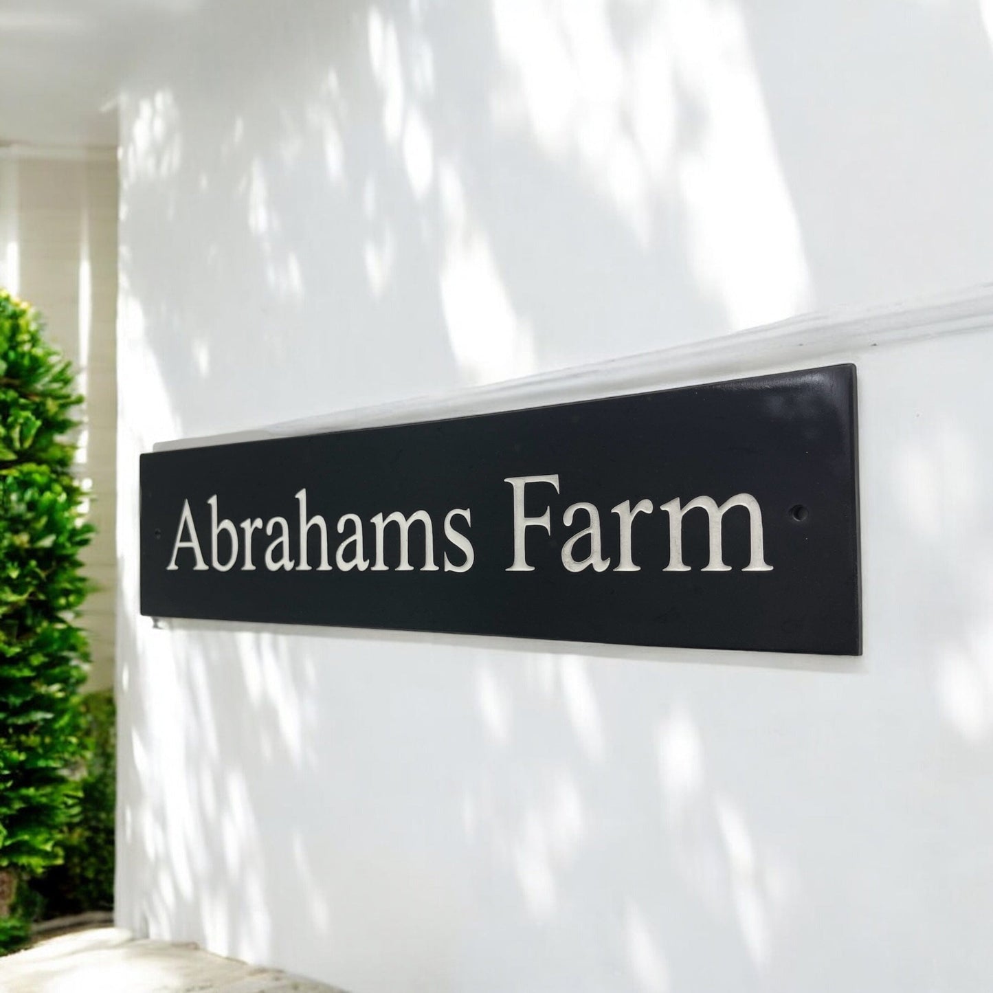 Introducing our stunning 40cm x 7.5cm Polished Natural Slate House Sign, designed to make a lasting impression! Crafted with durability in mind, it features beautifully carved lettering that enhances its elegance and visibility. Transform your home's entrance with this exquisite sign! www.HouseSign.co.uk