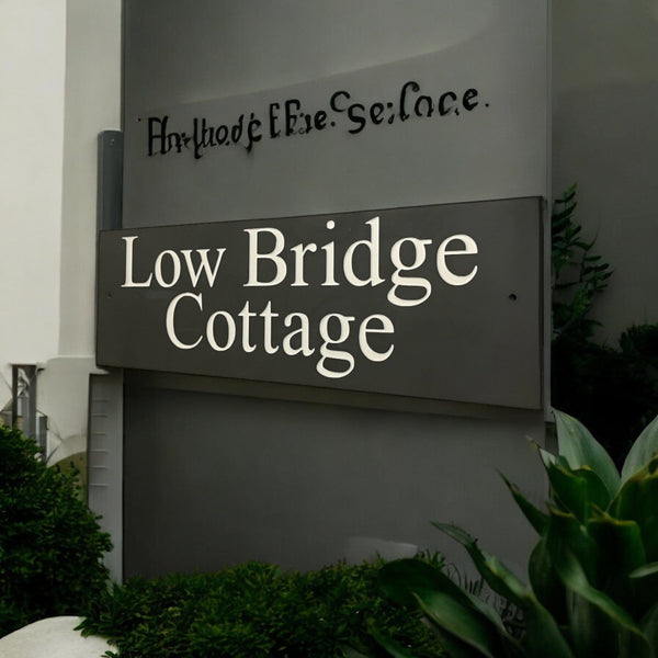 Introducing our stunning 41cm x 15cm Polished Natural Slate House Sign, designed to make a lasting impression! Crafted with durability in mind, it features beautifully carved lettering that enhances its elegance and visibility. Transform your home's entrance with this exquisite sign! www.HouseSign.co.uk