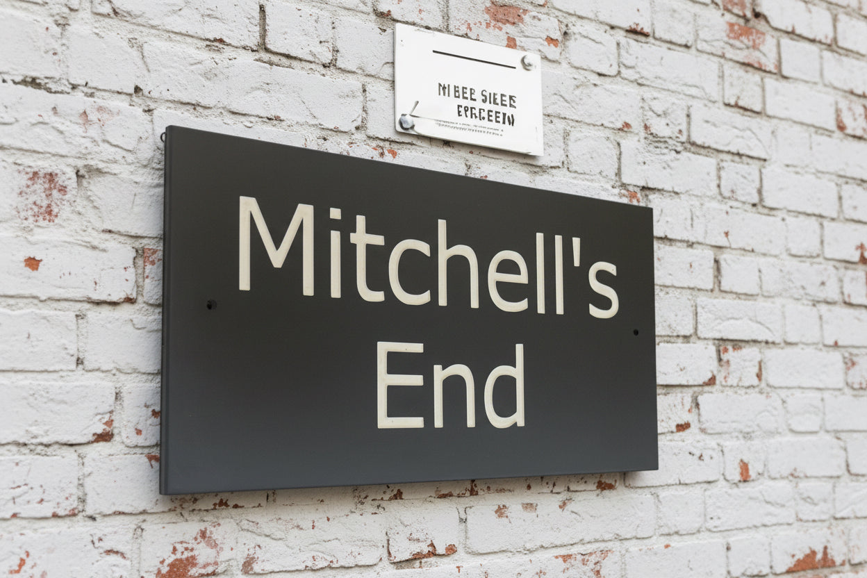 Introducing our stunning 41cm x 22.5cm Polished Natural Slate House Sign, designed to make a lasting impression! Crafted with durability in mind, it features beautifully carved lettering that enhances its elegance and visibility. Transform your home's entrance with this exquisite sign! www.HouseSign.co.uk
