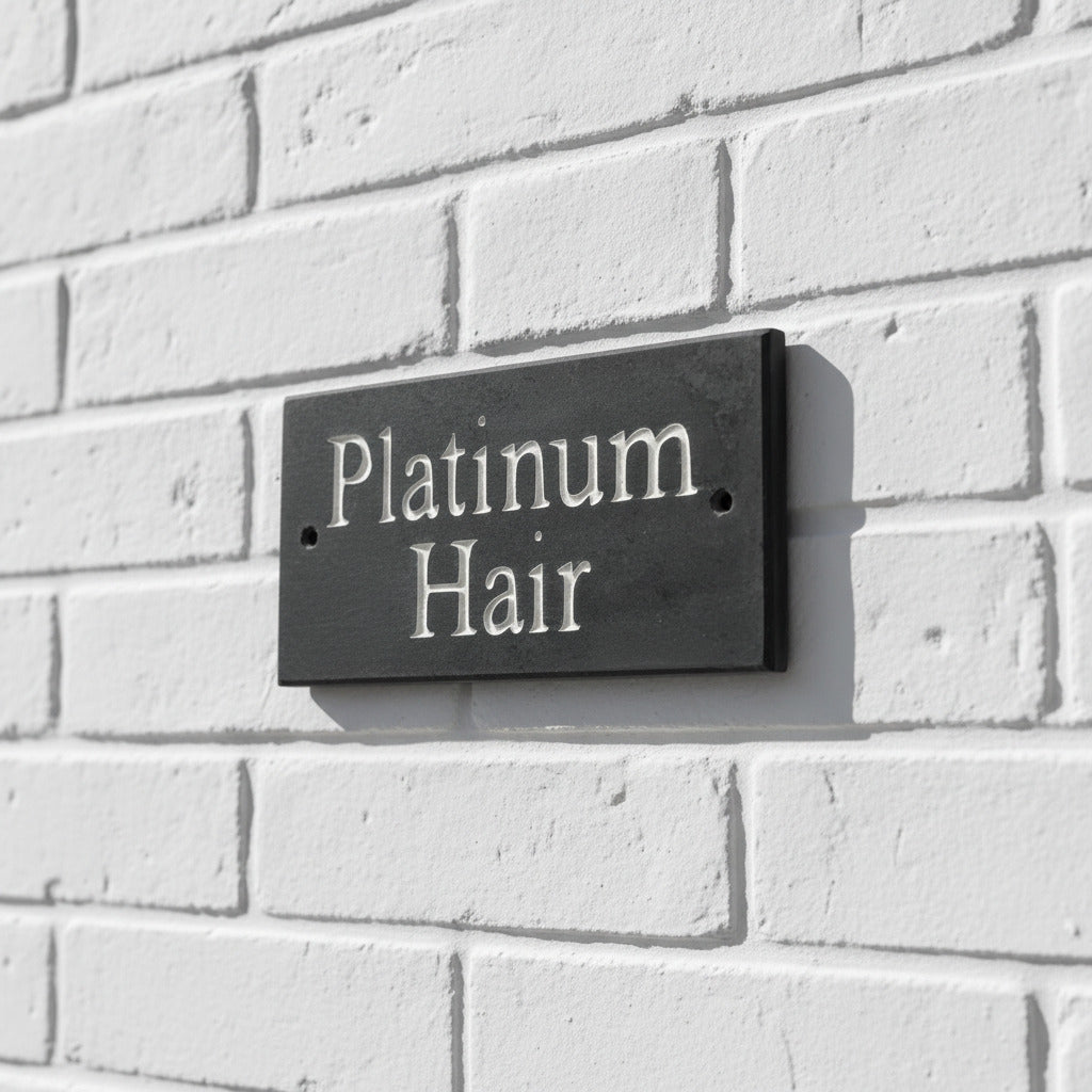 Introducing our stunning 15cm x 7.5cm Polished Natural Slate House Sign, designed to make a lasting impression! Crafted with durability in mind, it features beautifully carved lettering that enhances its elegance and visibility. Transform your home's entrance with this exquisite sign! www.HouseSign.co.uk