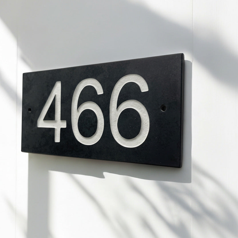 Introducing our stunning 20cm x 10cm Polished Natural Slate House Sign, designed to make a lasting impression! Crafted with durability in mind, it features beautifully carved lettering that enhances its elegance and visibility. Transform your home's entrance with this exquisite sign! www.HouseSign.co.uk