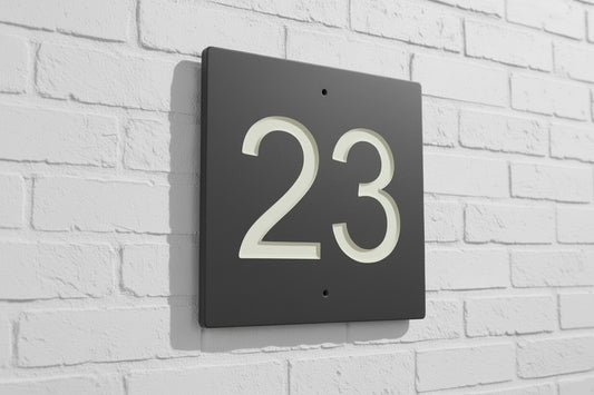 Introducing our stunning 22.5cm x 22.5cm Polished Natural Slate House Sign, designed to make a lasting impression! Crafted with durability in mind, it features beautifully carved lettering that enhances its elegance and visibility. Transform your home's entrance with this exquisite sign! www.HouseSign.co.uk