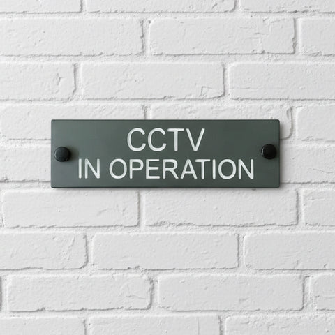 A CCTV Gate Or Wall Sign made in Natural Slate with polished edges and hard-wearing carved lettering size 20cm x 6cm www.HouseSign.co.uk