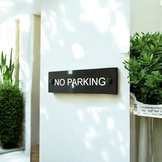 A No Parking Sign made in Natural Slate with polished edges and hard-wearing carved lettering www.HouseSign.co.uk