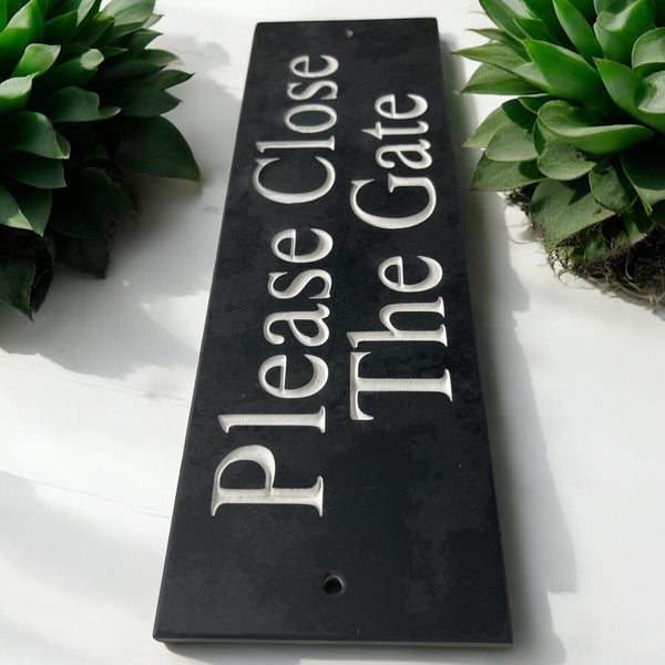 A Please Close The Gate Sign made in Natural Slate with polished edges and hard-wearing carved lettering www.HouseSign.co.uk
