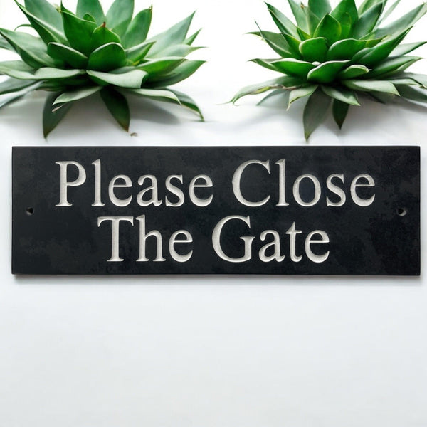 A Please Close The Gate Sign made in Natural Slate with polished edges and hard-wearing carved lettering www.HouseSign.co.uk