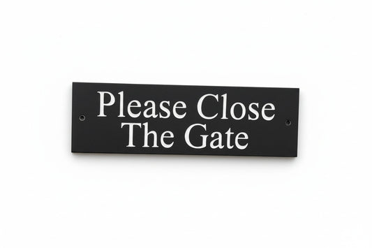 A Please Close The Gate Sign made in Natural Slate with polished edges and hard-wearing carved lettering sign size 30cm x 10cm www.HouseSign.co.uk