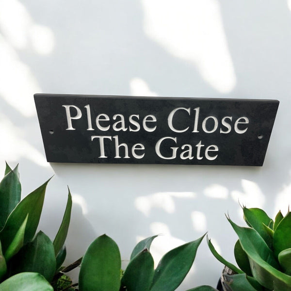 A Please Close The Gate Sign made in Natural Slate with polished edges and hard-wearing carved lettering sign size 30cm x 10cm www.HouseSign.co.uk