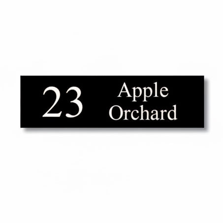 A black square House Sign with clear deep cut numbers featuring a green plant placed elegantly on its surface www.HouseSign.co.uk 