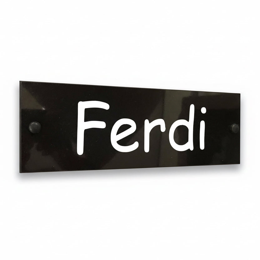 A black square House Sign with clear deep-cut numbers featuring a green plant placed elegantly on its surface www.HouseSign.co.uk 