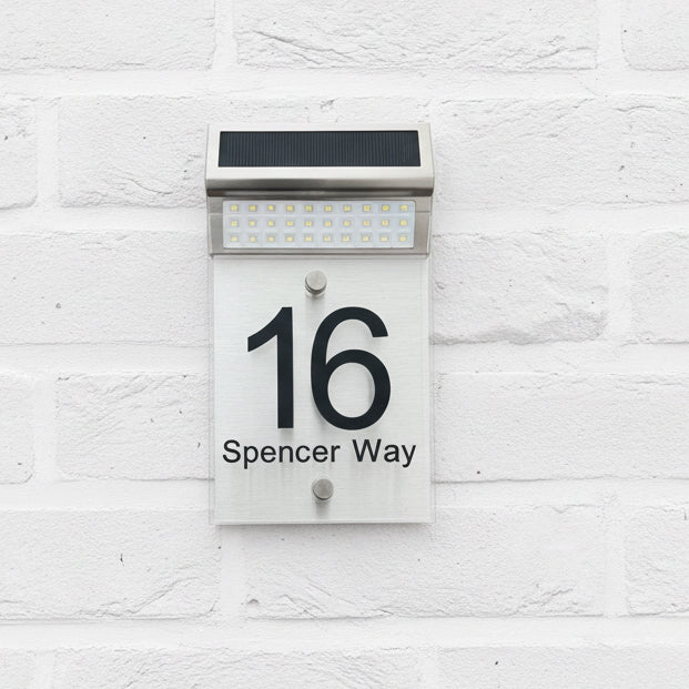 LED Solar Acrylic House Sign on a painted brick wall www.HouseSign.co.uk 