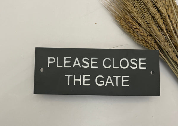 A Please Close The Gate Sign made in Natural Slate with polished edges and hard-wearing carved lettering www.HouseSign.co.uk