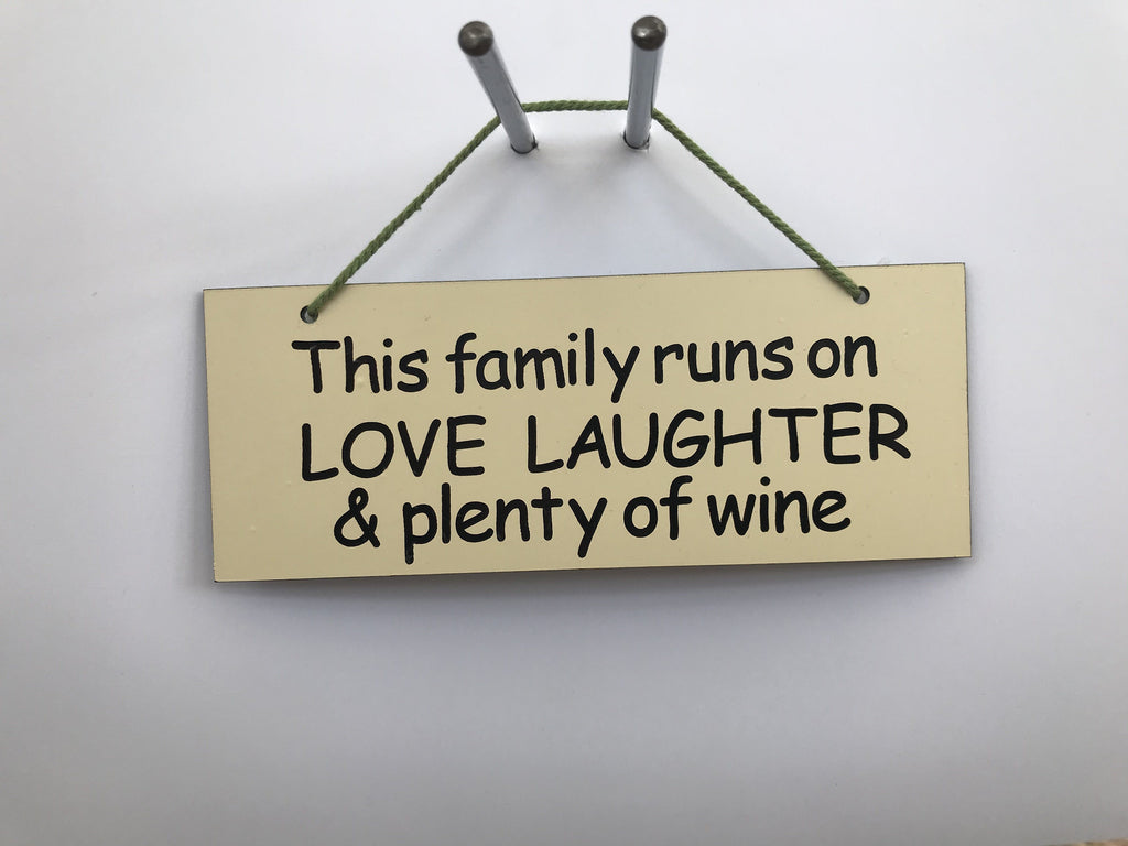 This family runs on LOVE LAUGHTER & plenty of wine Gifts www.HouseSign.co.uk 